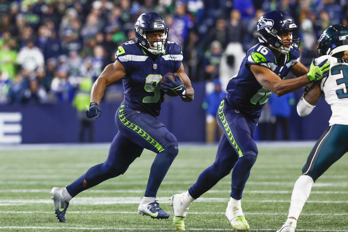 Dec 18, 2023; Seattle, Washington, USA; Seattle Seahawks running back Kenneth Walker III (9) rushes against the Philadelphia Eagles during the fourth quarter at Lumen Field.